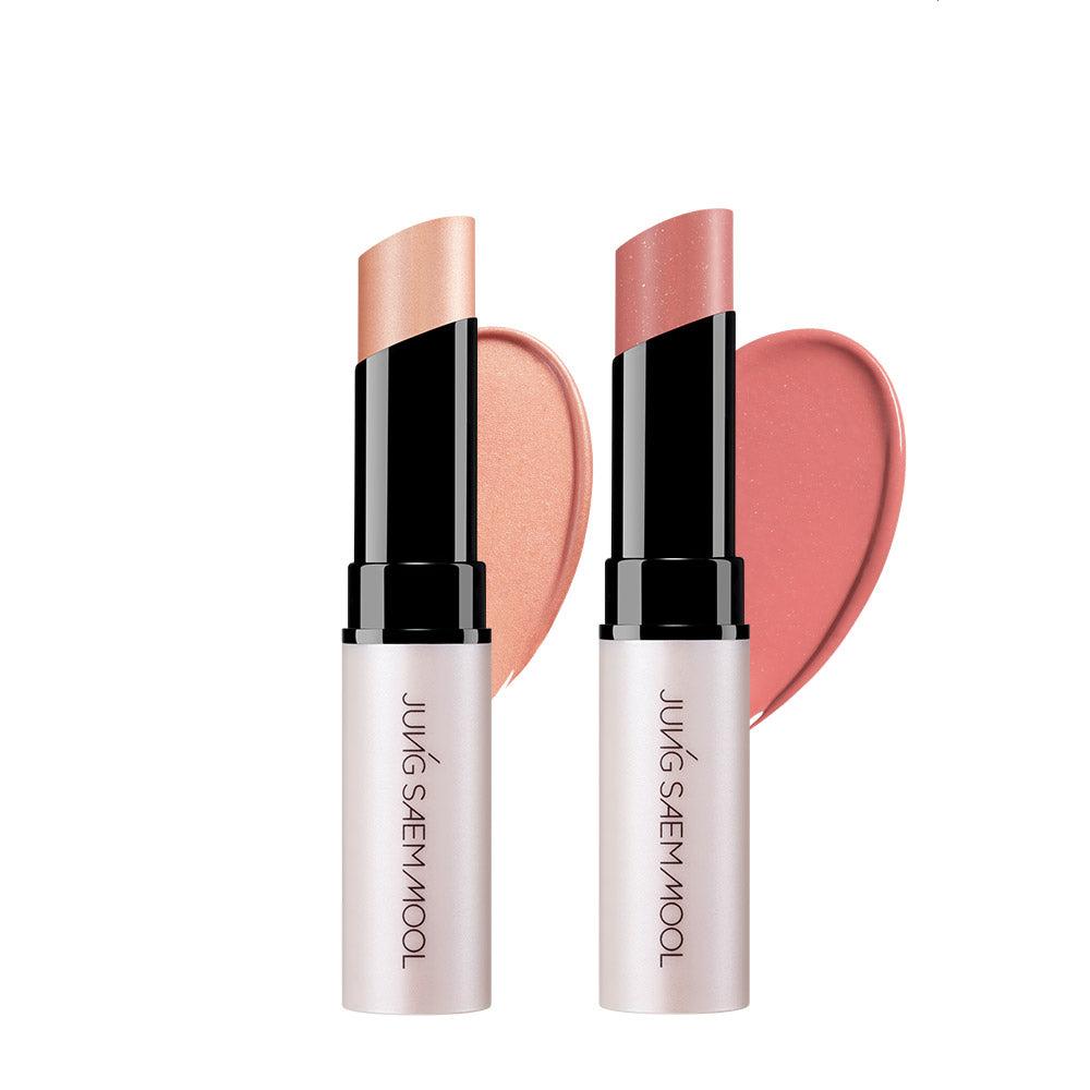 AgelessBeauty3000.com JUNGSAEMMOOL| LIP-PRESSION Glow Lip Balm Two cosmetic sticks with pink blushes and black caps on a white background, featuring the brand 'Jung Saemmul'.