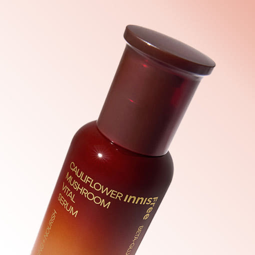AgelessBeauty3000.com Innisfree | Cauliflower Mushroom Vital Serum Cauliflower Mushroom Vital Serum bottle with gradient design on a light pink background