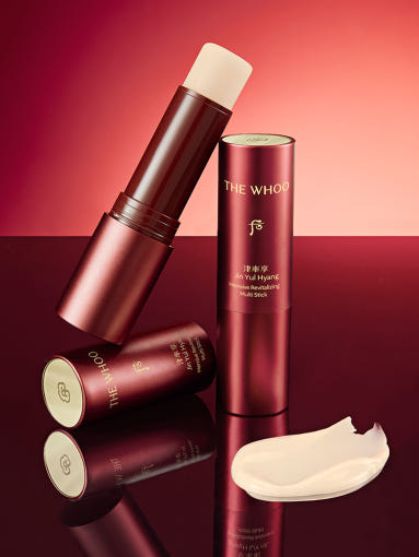 Red cylindrical container with 'The Whoo' branding on a white background AgelessBeauty3000.com THE WHOO | Jinyulhyang Intensive Revitalizing Multi Stick
