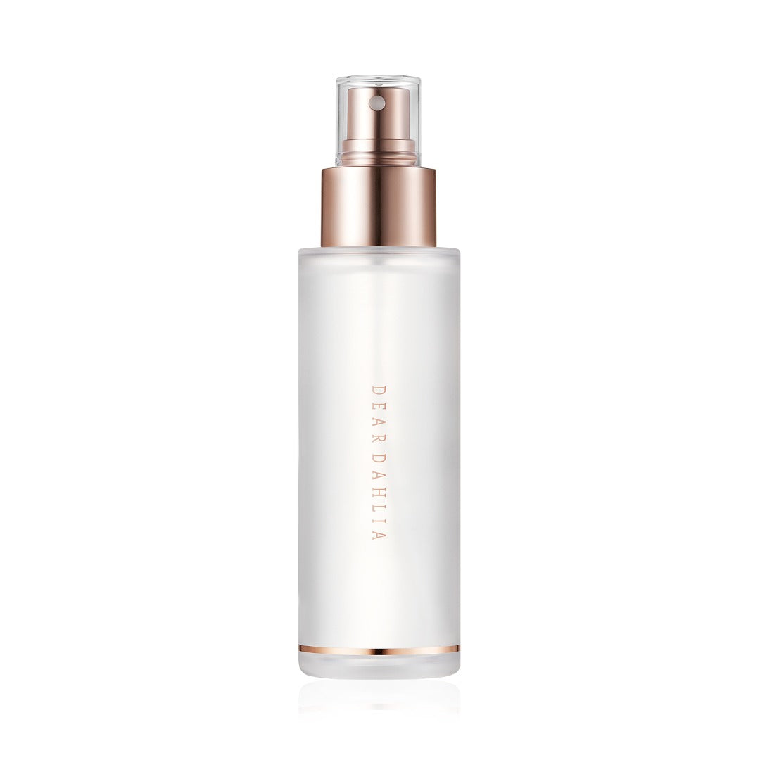 Skincare bottle with rose gold cap and base on a white background AgelessBeautz3000.com DEAR DAHLIA | Endless Skin Setting Spray