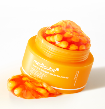 AgelessBeauty3000.com medicube | Kojic Acid Turmeric Vita Capsule Cream Orange cream container with visible brand name on a white background