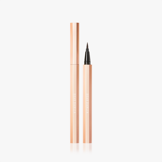Rose gold eyeliner pen on a white background  AgelessBeauty3000.com  DEAR DAHLIA  |  Paradise Dream Precision Pro Liquid Eyeliner