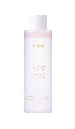 Huxley skincare bottle on a white background  AgelessBeauty3000.com   Huxley  |  Skin Glow Toner Vita Radiance