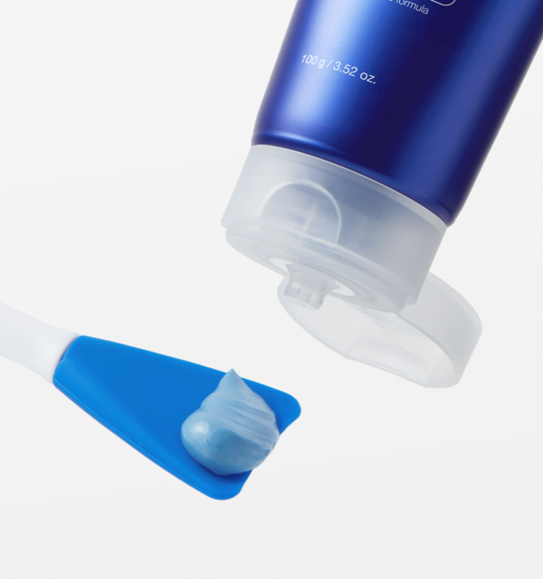 AgelessBeauty3000.com  medicube | Zero Pore Blackhead Mud Mask  Blue tube of cream with a applicator on a white background