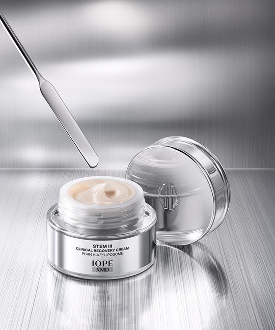 IOPE XMD skincare cream jar on a light gray background  AgelessBeauty3000.com  IOPE  |  XMD STEM III Clinical Recovery Cream