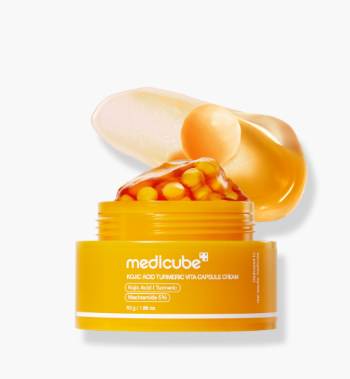 AgelessBeauty3000.com medicube | Kojic Acid Turmeric Vita Capsule Cream  Medicube cream with open cap on a white background 